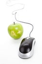 Green apple and computer mouse Royalty Free Stock Photo