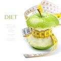 Green apple core and measuring tape Royalty Free Stock Photo