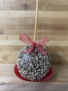 Semisweet chocolate covered apples and a ribbon Royalty Free Stock Photo