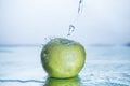 Green apple with freezed water splash Royalty Free Stock Photo