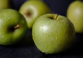 Green apple, isolated on black background Royalty Free Stock Photo