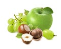 Green apple, grapes and hazelnuts isolated on white background Royalty Free Stock Photo