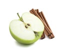 Green apple half cinnamon sticks 2 isolated Royalty Free Stock Photo