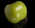 Green apple isolated on black Royalty Free Stock Photo