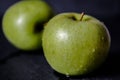 Green apple, isolated on black background Royalty Free Stock Photo