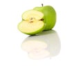 A green apple and its reflection Royalty Free Stock Photo