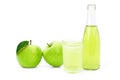 Green apples  granny smith  with glass bottle of apple juice isolated on white. Royalty Free Stock Photo