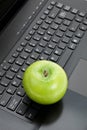 Green apple and laptop