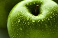 Green apple macro in selective focus Royalty Free Stock Photo