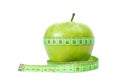 Green apple and measurement tape