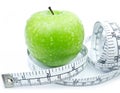 Green Apple with measuring tape Royalty Free Stock Photo