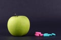 GREEN APPLE AND MEDICINE 2 Royalty Free Stock Photo