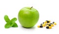 Green apple mint and pills capsules Royalty Free Stock Photo