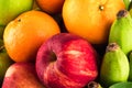 Green apple and orange and red apple and banana are mixed tasty fruit composition on  background fruit health food Royalty Free Stock Photo