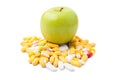 Green apple on pills Royalty Free Stock Photo