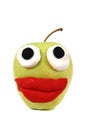 Green apple with plasticine smile Royalty Free Stock Photo
