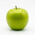 Green apple, possibly a Granny Smith, is displayed against a plain Royalty Free Stock Photo