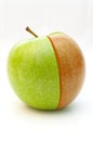 Green apple and red segment Royalty Free Stock Photo