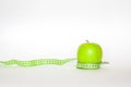 green apple and the ruler Royalty Free Stock Photo