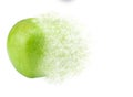 green apple scattered into small pieces isolated on white background Royalty Free Stock Photo