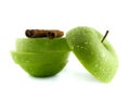 green apple slices with cinnamon pods Royalty Free Stock Photo
