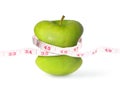 Green apple with slim waist and measuring tape