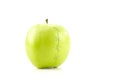 Green apple with stapled crack Royalty Free Stock Photo