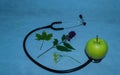 Green apple, stethoscope Royalty Free Stock Photo