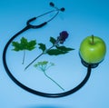 Green apple, stethoscope Royalty Free Stock Photo