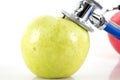 Green apple and stethoscope on white background Royalty Free Stock Photo