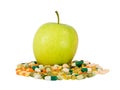 Green apple vs. pills Royalty Free Stock Photo