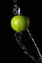 Green apple and water splash Royalty Free Stock Photo