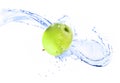 Green apple with water splash, isolated