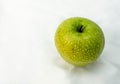 Green apple wet with water drops on a white background Royalty Free Stock Photo