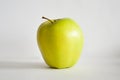 Green apple on a white background. Healthy eating, diet, lifestyle concept, treatment choice concept. High quality photo Royalty Free Stock Photo