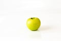 Green apple on white ground Royalty Free Stock Photo
