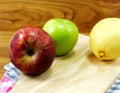 Green apple yellow chinese pear and red apple Royalty Free Stock Photo