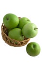 Green apples in a basket isolated Royalty Free Stock Photo