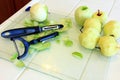 Green Apples being Peeled for baking Royalty Free Stock Photo