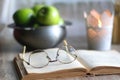 Green Apples, Book and Candle Royalty Free Stock Photo