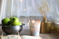 Green Apples, Book and Candle Royalty Free Stock Photo