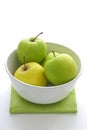 Green apples in a bowl Royalty Free Stock Photo
