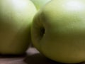 Green apples of the Reinette Simirenko variety, close-up