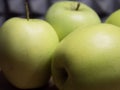 Green apples of the Reinette Simirenko variety, close-up