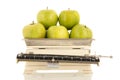 Green apples on weight scale