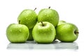 Green apples on a white background with a stem