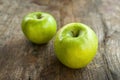 Green apples on wood table Royalty Free Stock Photo