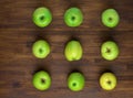 Green appples on dark wooden background. Top view Royalty Free Stock Photo
