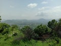 Green Aravali mountain and sky in UDAIPUR CITY RAJASTHAN IN INDIA Royalty Free Stock Photo