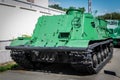 Green armored tracked military tractor